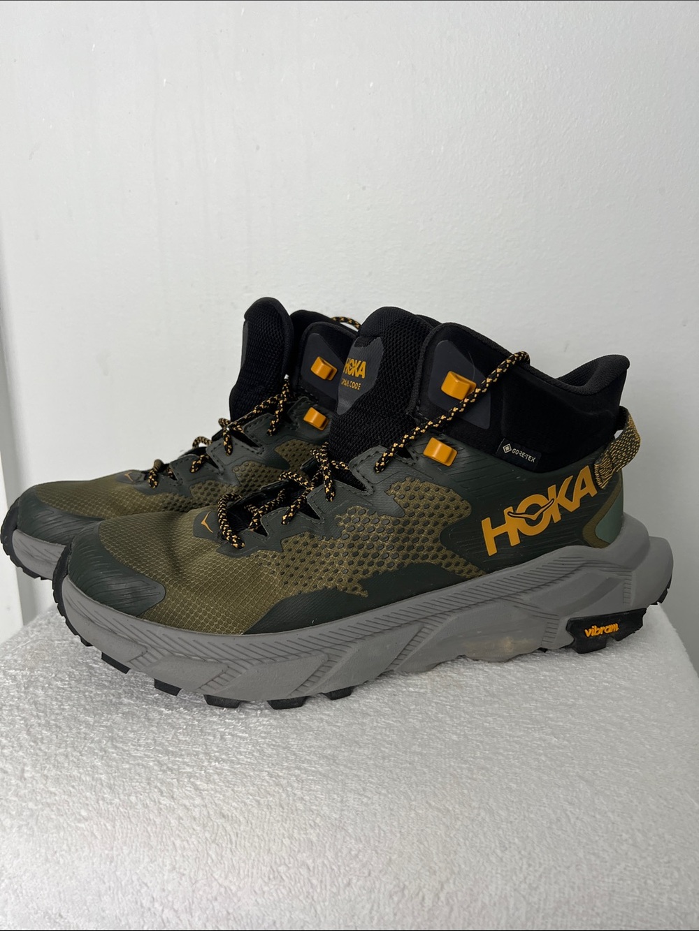 Hoka Men's Olive Green and Black Trail Sneakers with Yellow Accents